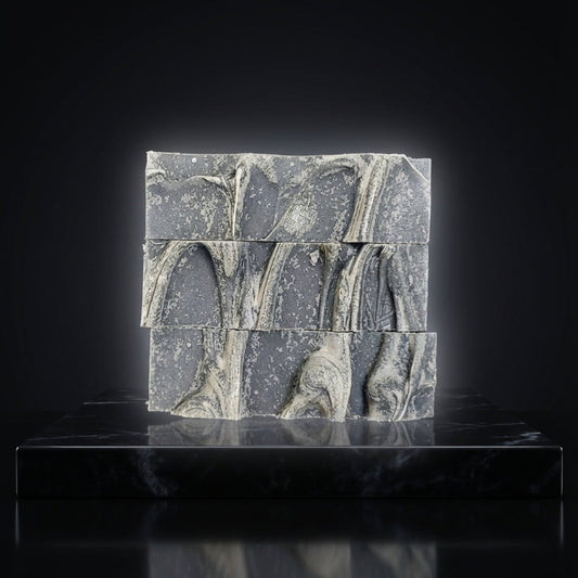 You will be generating high-quality product photos for an online stores product page. The product images should closely match the original products.
      Here is the prompt (IMPORTANT!): """A high-resolution studio shot featuring the 'Black Magic Soap - A