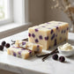 You will be generating high-quality product photos for an online stores product page. The product images should closely match the original products.
      Here is the prompt (IMPORTANT!): """A sophisticated product shot of the 'Black Raspberry Vanilla Soap