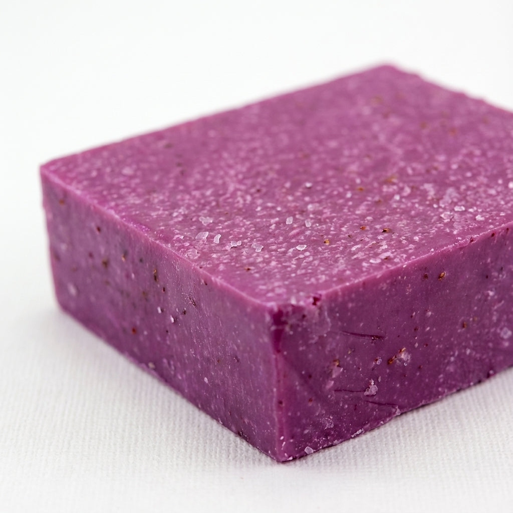 You will be generating high-quality product photos for an online stores product page. The product images should closely match the original products.
      Here is the prompt (IMPORTANT!): """An artistic, close-up studio shot of the 'Butt Naked Scrub Soap' 
