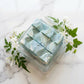 You will be generating high-quality product photos for an online stores product page. The product images should closely match the original products.
      Here is the prompt (IMPORTANT!): """An overhead shot of the soap placed on an elegant marble countert