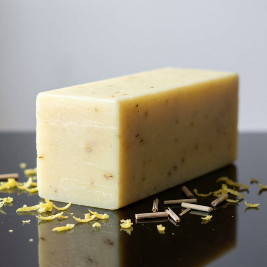 You will be generating high-quality product photos for an online stores product page. The product images should closely match the original products.
      Here is the prompt (IMPORTANT!): """A high-resolution studio shot of a bar of Lemongrass Soap, placed