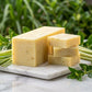 You will be generating high-quality product photos for an online stores product page. The product images should closely match the original products.
      Here is the prompt (IMPORTANT!): """A cinematic, product-focused shot of Lemongrass Soap on a marble 