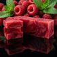 You will be generating high-quality product photos for an online stores product page. The product images should closely match the original products.
      Here is the prompt (IMPORTANT!): """A close-up shot of the Raspberry Mint Soap in a luxurious, high-e