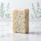 You will be generating high-quality product photos for an online stores product page. The product images should closely match the original products.
      Here is the prompt (IMPORTANT!): """A high-angle studio shot of the Rosemary & Thyme Soap standing up