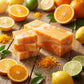You will be generating high-quality product photos for an online stores product page. The product images should closely match the original products.
      Here is the prompt (IMPORTANT!): """An artistic flat-lay composition of the 'Summer Citrus Soap' surr