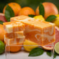 You will be generating high-quality product photos for an online stores product page. The product images should closely match the original products.
      Here is the prompt (IMPORTANT!): """A cinematic, close-up shot of the 'Summer Citrus Soap' with a sha