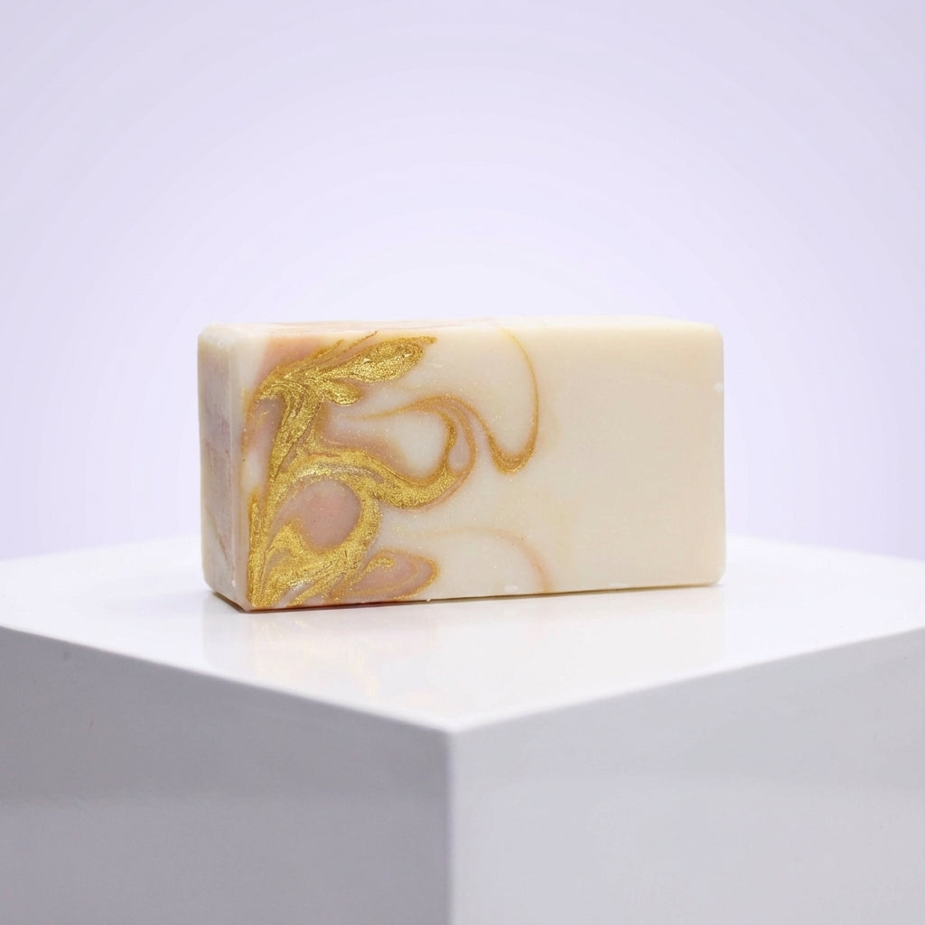 You will be generating high-quality product photos for an online stores product page. The product images should closely match the original products.
      Here is the prompt (IMPORTANT!): """A highly stylized, editorial-like image of the Yoni Soap presente